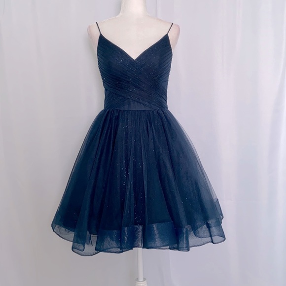 🤩 Glamour by Terani Couture
Sweetheart Neck Glitter Tulle Skirt Dress - Picture 6 of 9